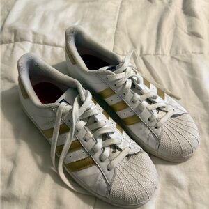 Adidas Women's White and Gold Striped Sneakers